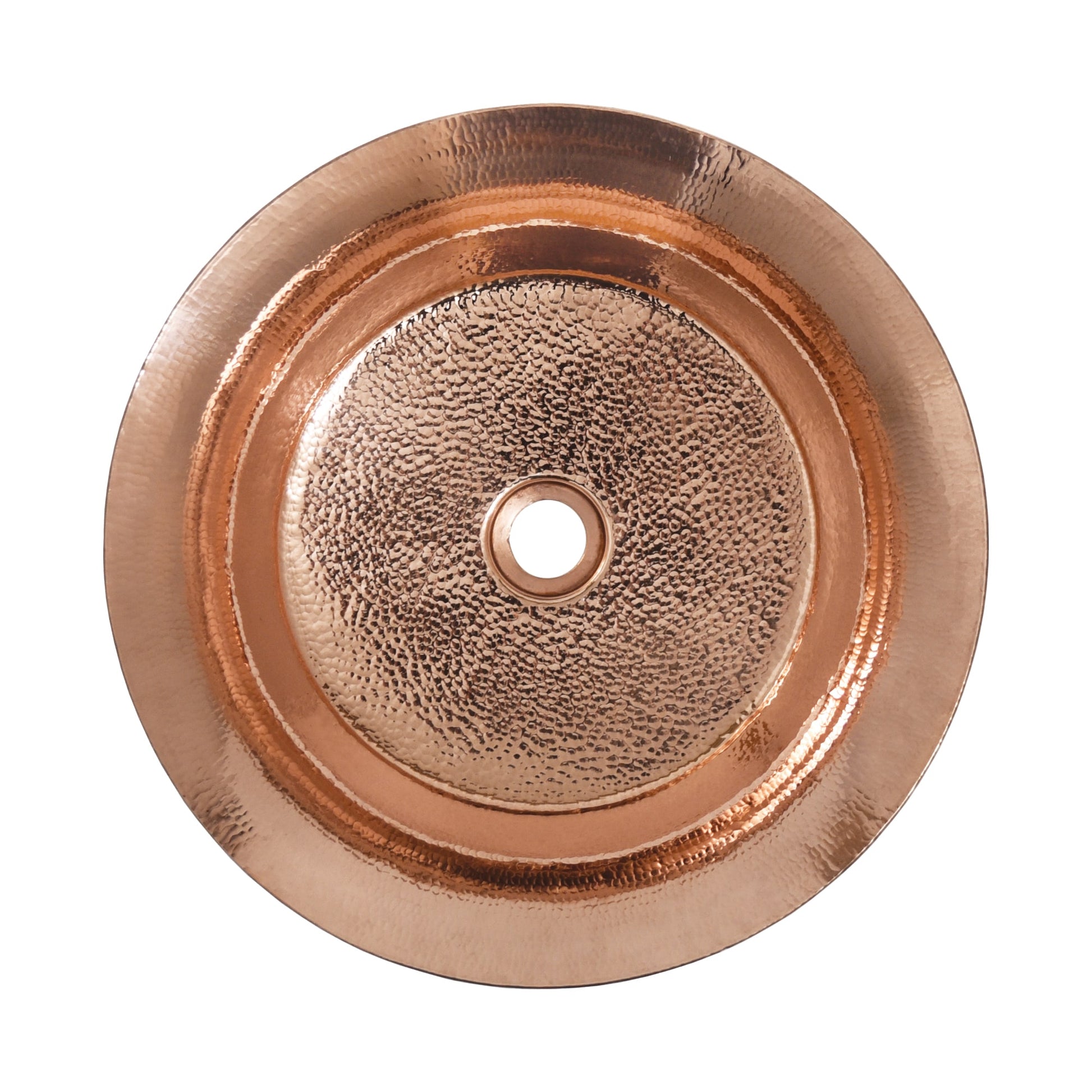 Polished copper round sink with hammered center basin and concentric rim detail, viewed from above.