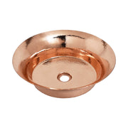 Polished copper round undermount sink with textured interior surface and center drain opening.