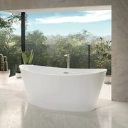 White oval freestanding soaker bathtub with curved edges and centered drain, positioned on polished concrete floor.