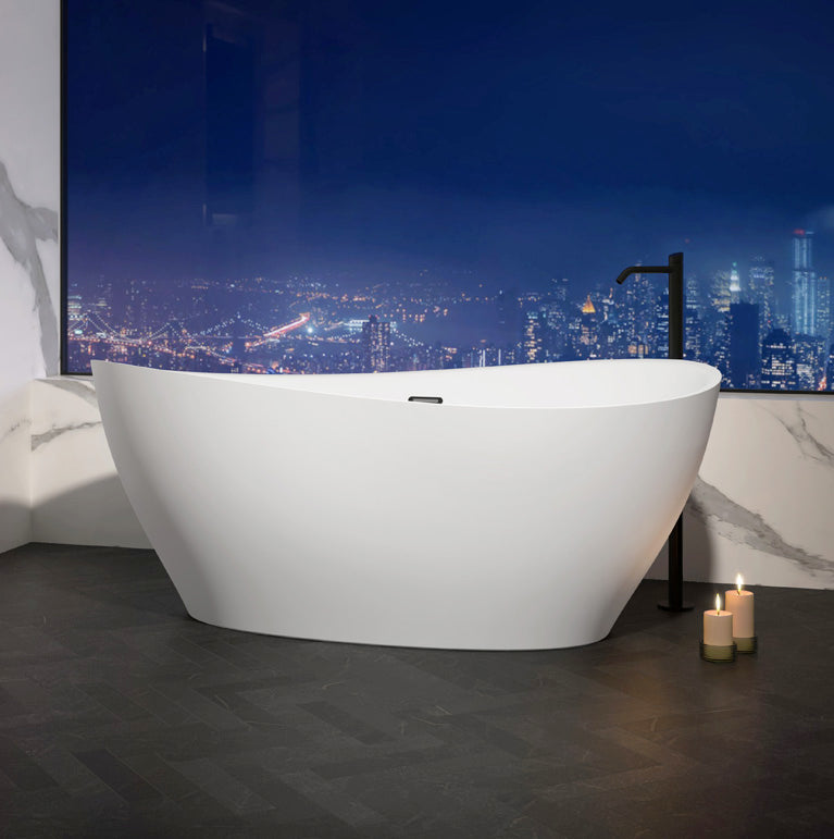 White oval freestanding soaker bathtub with black faucet and heated backrest in modern bathroom setting.