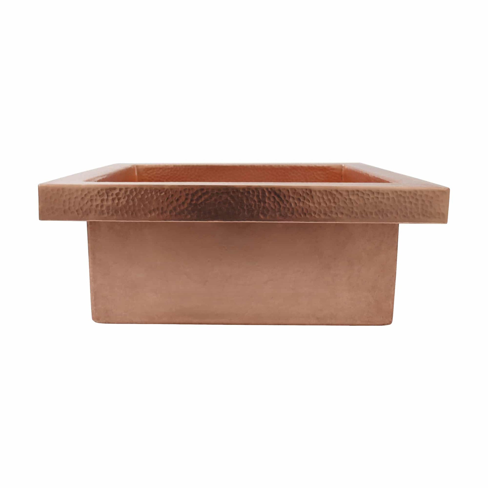 Polished copper rectangular sink with hammered rim and smooth bowl sides.