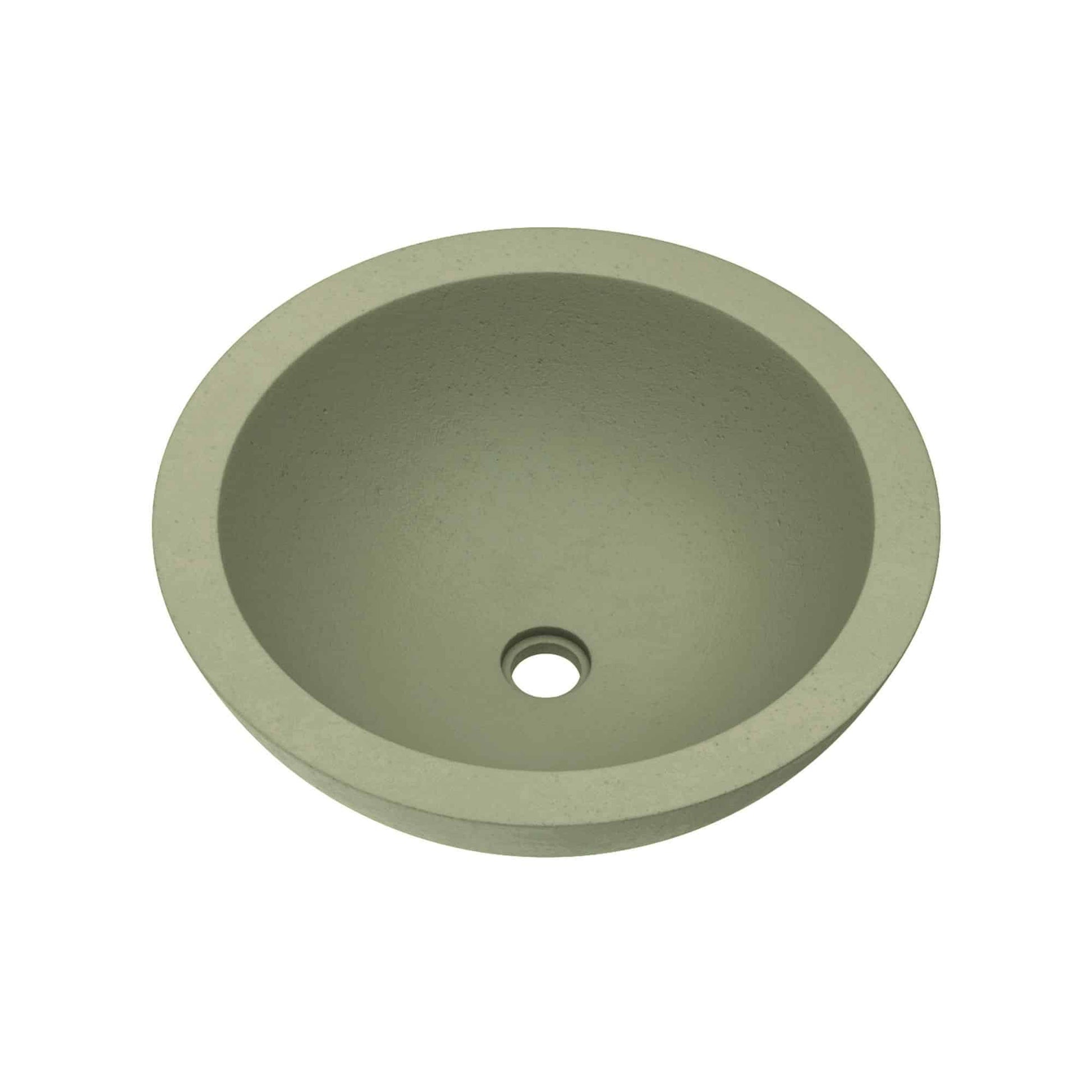 Sage green round concrete sink with single drain hole, viewed from above.