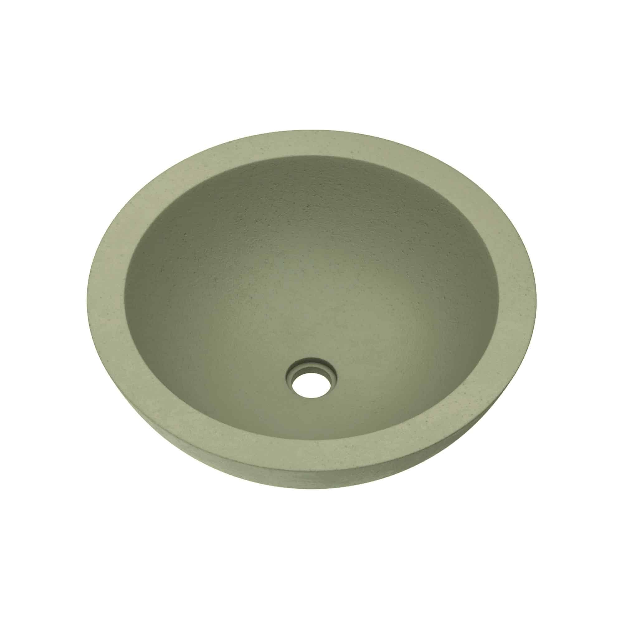 Sage green round concrete sink with single drain hole, viewed from above.