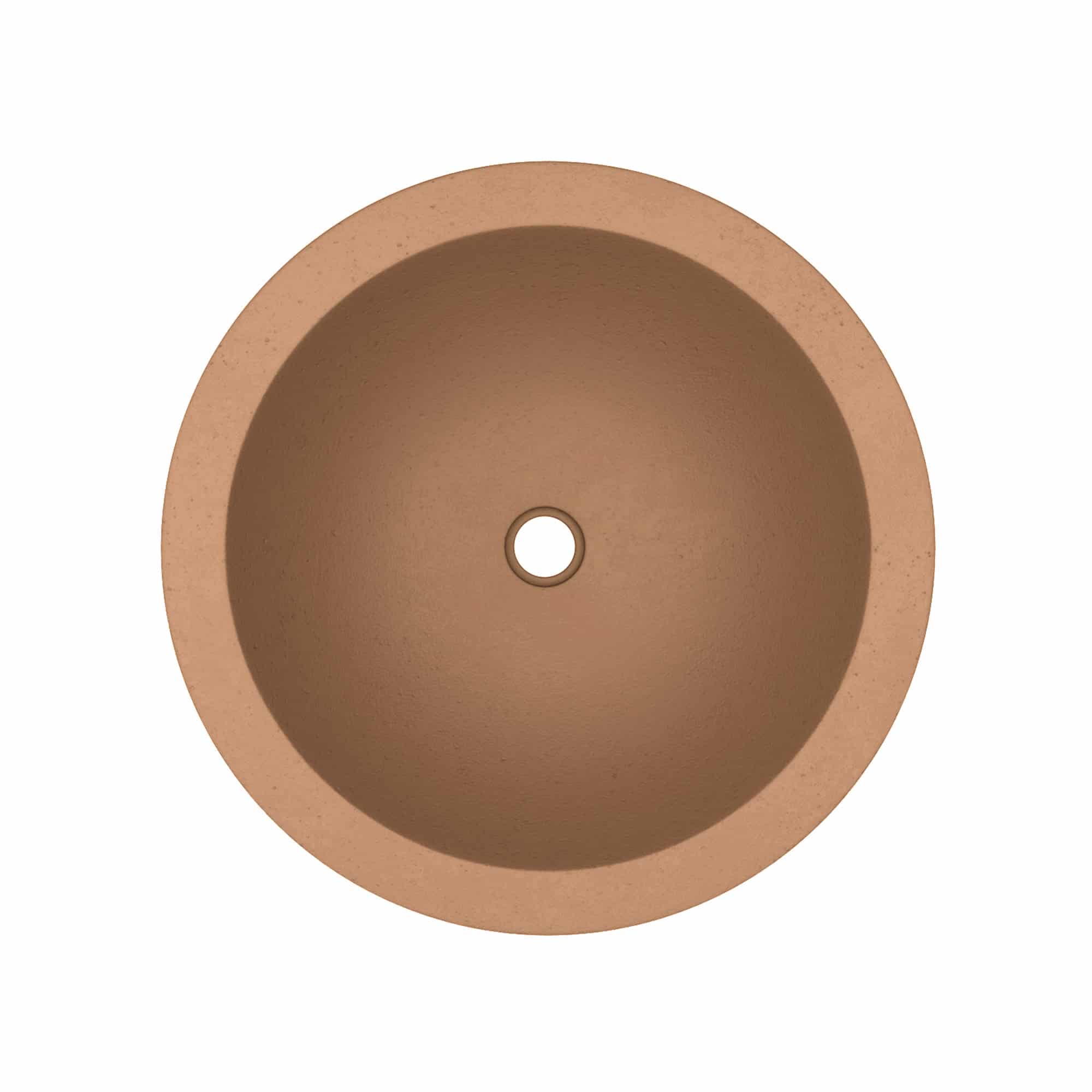 Terracotta round sink with centered drain hole, viewed from above.