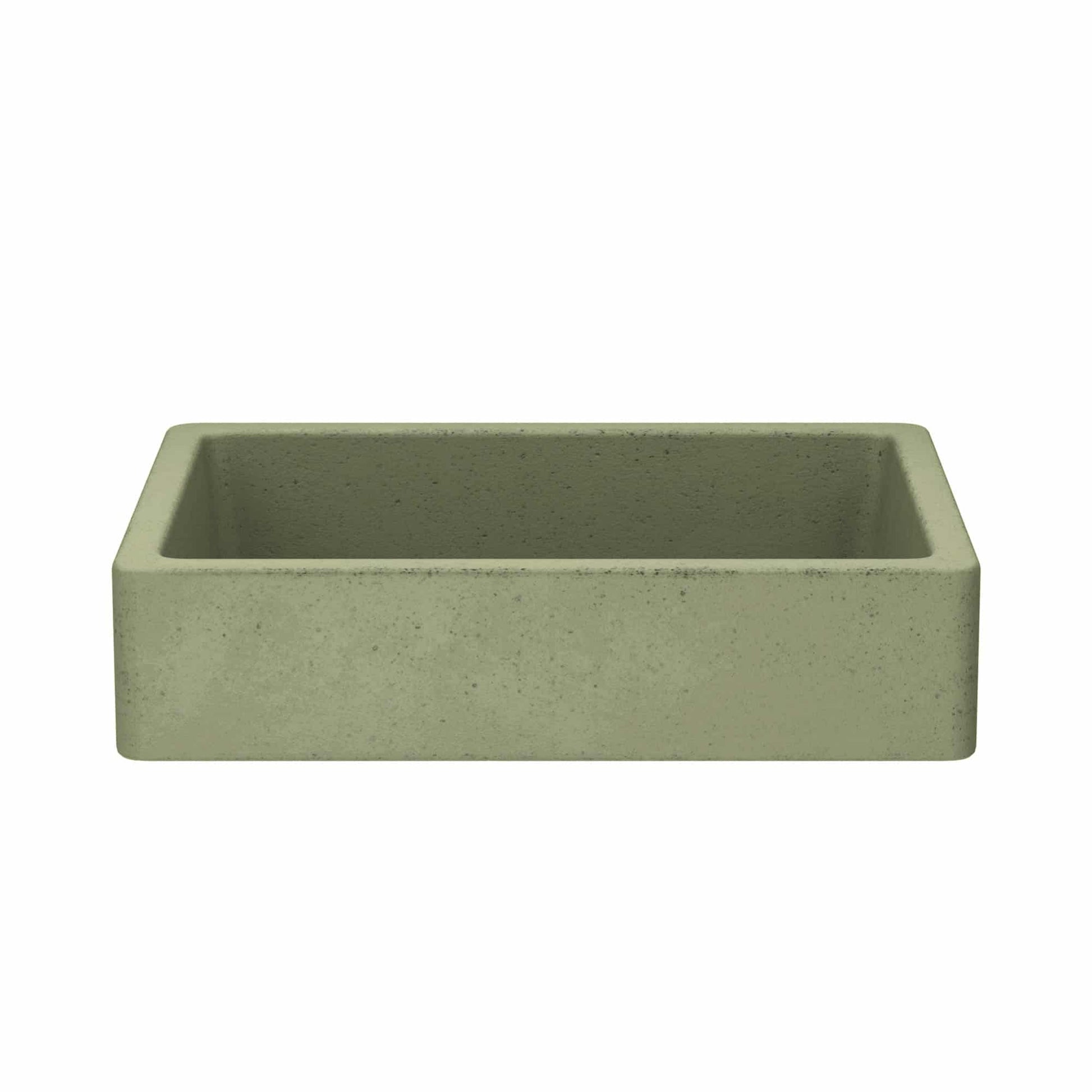 Sage green concrete farmhouse sink with speckled finish and curved interior edges.