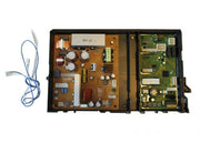 Noritz SHC71LF circuit control board with brown and green circuit panels, capacitors, and attached blue wire connector.