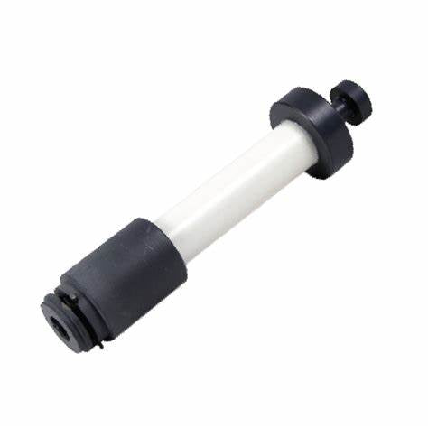Black and white seal puller tool with cylindrical shaft and threaded ends for water treatment systems.