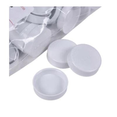 White PVC end caps displayed next to clear packaging bag.
