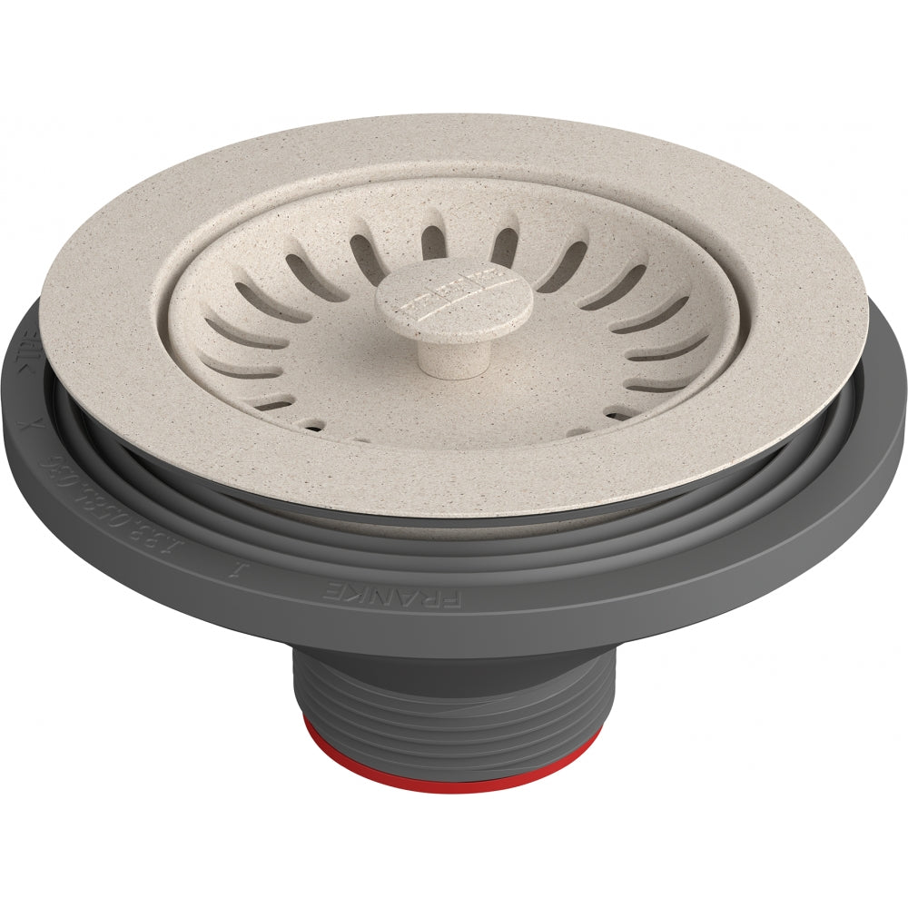 Champagne-colored strainer basket with perforated bowl, gray rubber collar, and threaded drain fitting with red seal.