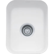 White fireclay undermount sink bowl with rounded corners and stainless steel drain strainer, viewed from above.