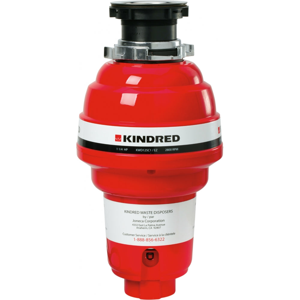 Red Kindred waste disposer with black top collar and mounting hardware, white band label with model information.