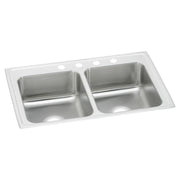 Stainless steel double bowl drop-in sink with white rim and four faucet holes across the top.
