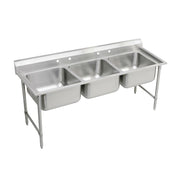 Stainless steel floor-mount scullery sink with three compartments and drainboard, supported by metal legs.