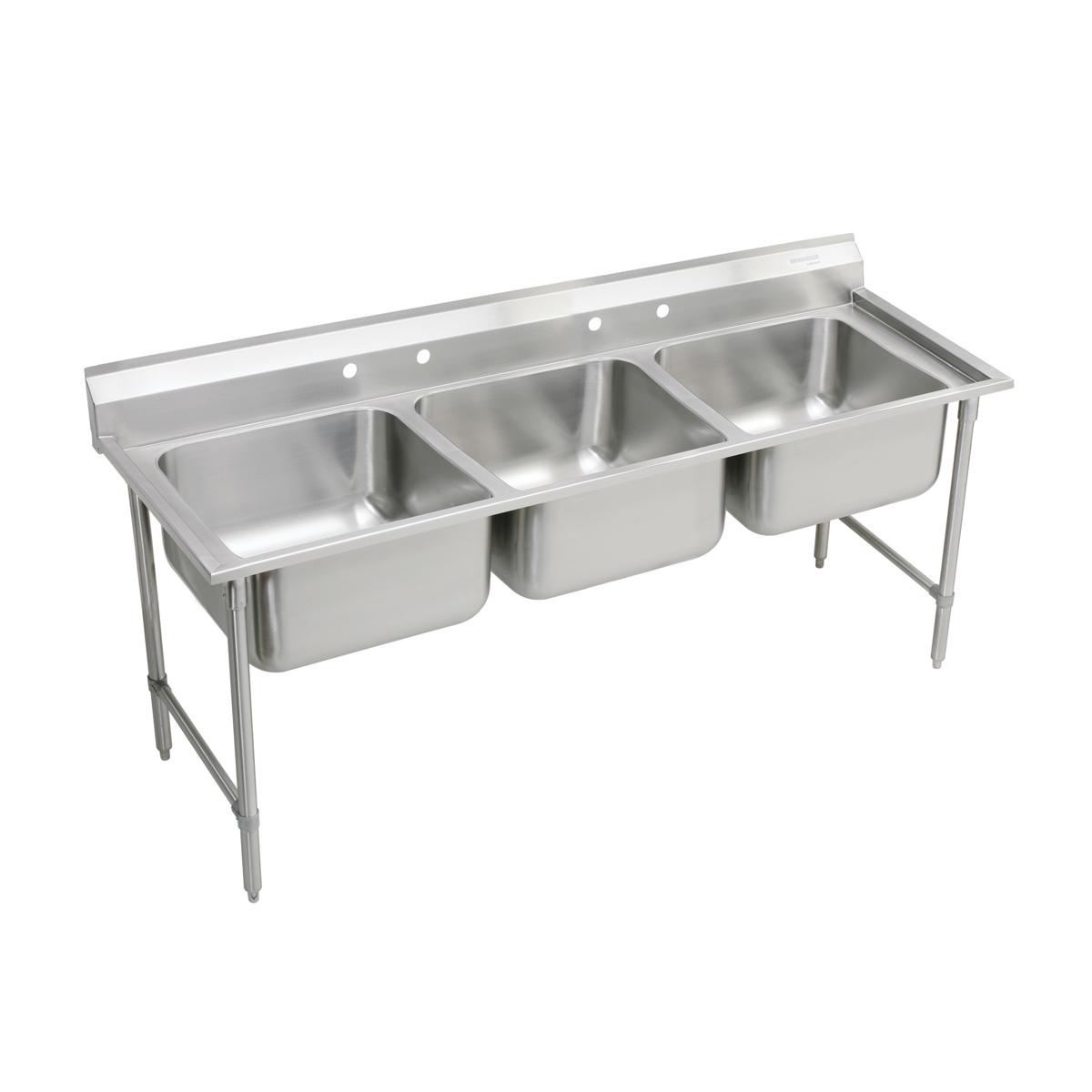 Stainless steel floor-mount scullery sink with three compartments and drainboard, supported by metal legs.