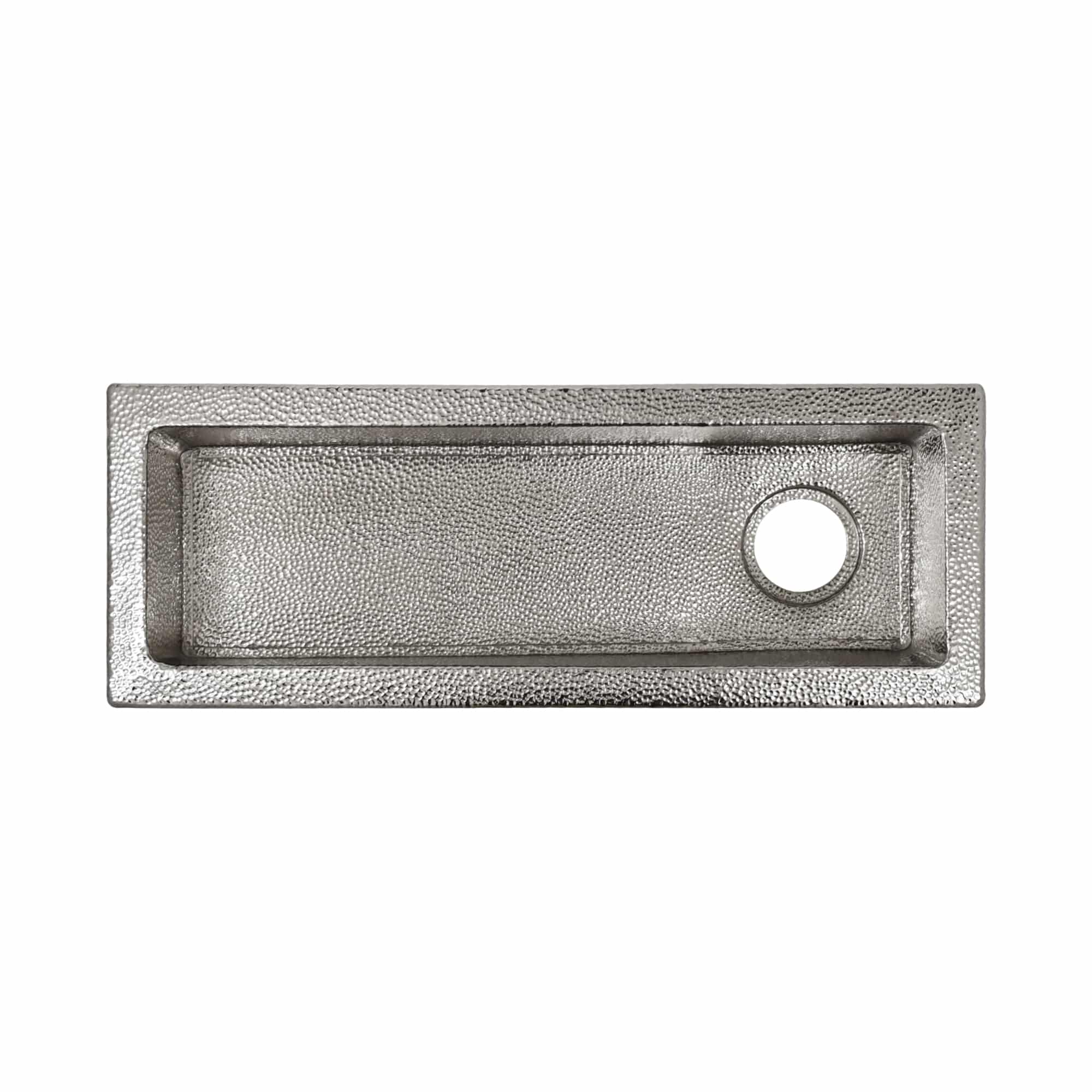 Polished nickel rectangular sink with textured surface and single drain hole on right side.