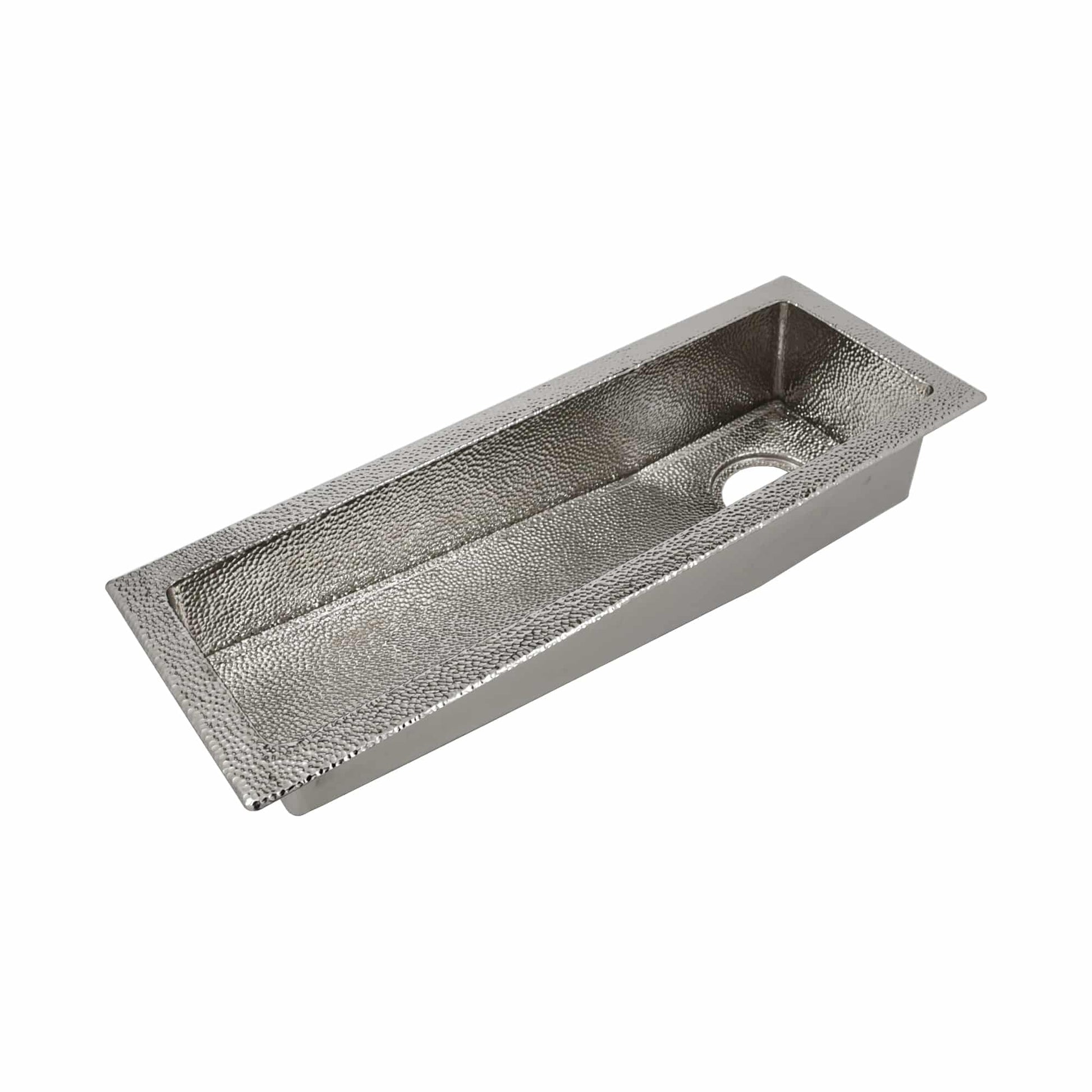 Polished nickel rectangular sink with hammered interior surface and single drain hole.