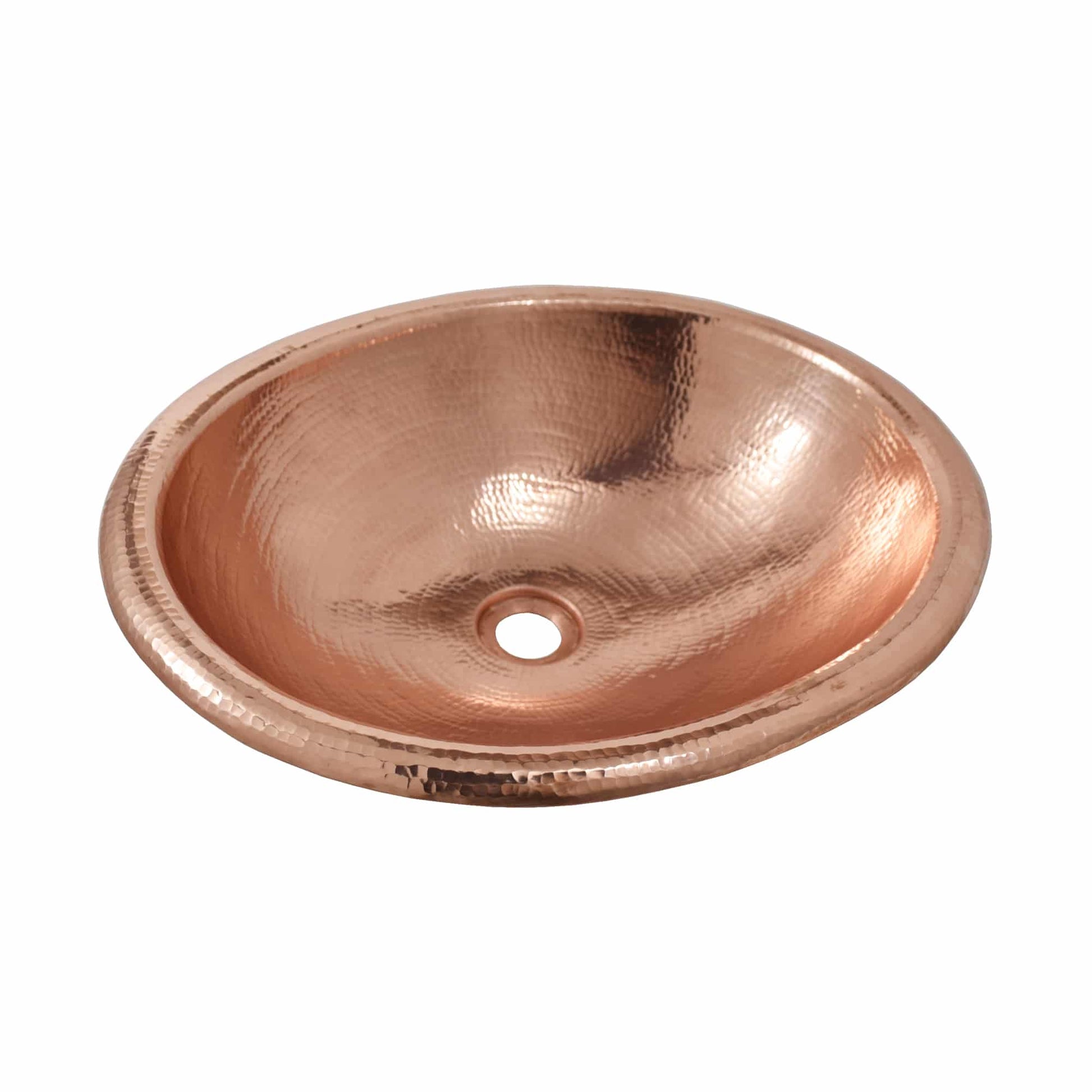 Polished copper oval sink with textured hammered surface and single drain hole.