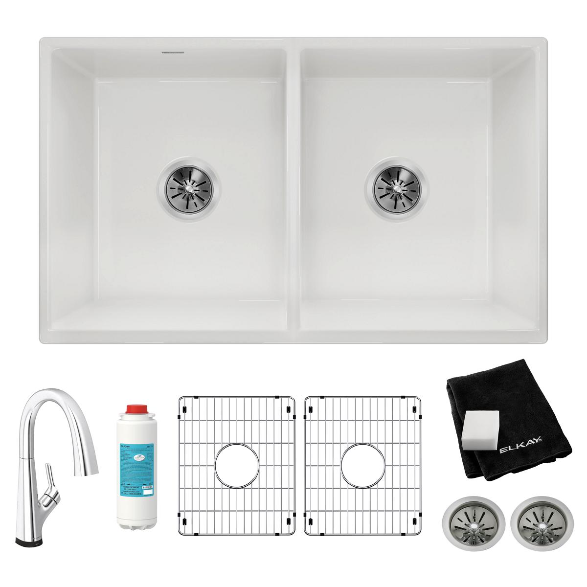 White fireclay double bowl farmhouse sink with two drains, accompanied by filtered faucet, grid inserts, filter cartridge, an