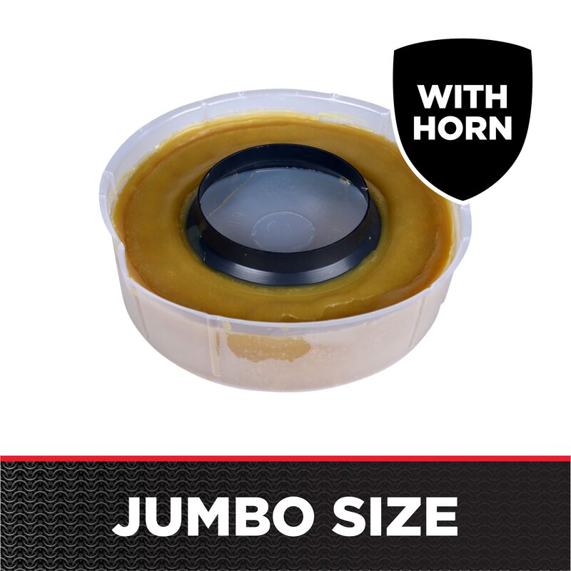 Yellow wax ring with black plastic horn insert in clear plastic container.