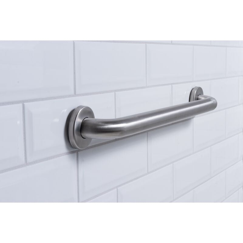 Satin stainless steel grab bar with concealed flanges mounted horizontally on white subway tile wall.