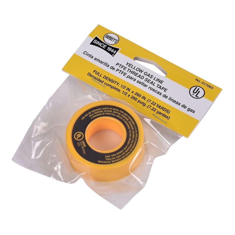 Yellow PTFE thread seal tape on orange spool with black label in clear plastic packaging.