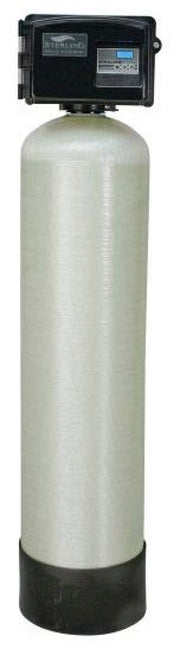 Tall cylindrical fiberglass water treatment tank with black control head featuring digital display and blue LCD screen mounte