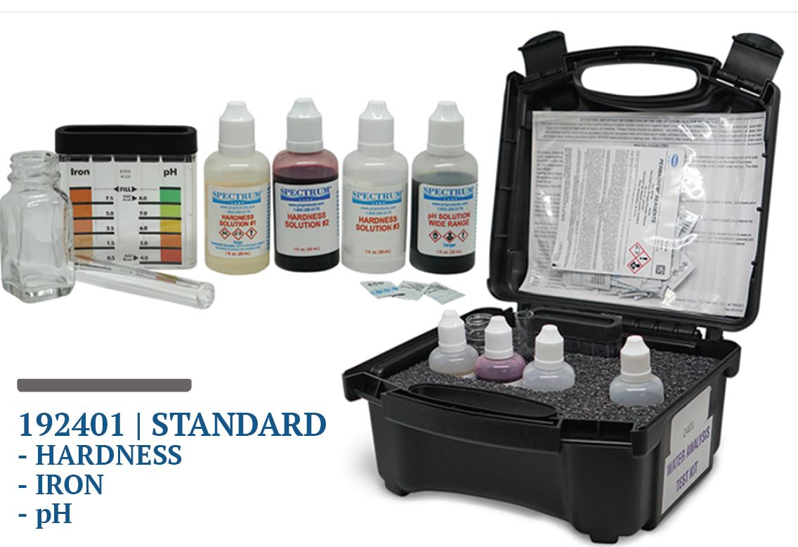 Sterling Water Treatment testing kit in black carrying case with color-coded hardness and pH test strip chart, four liquid re