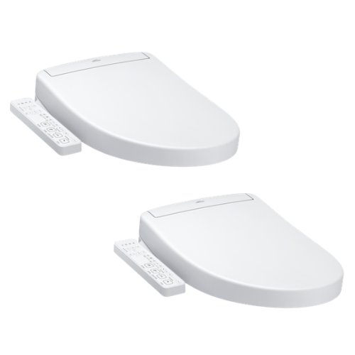 Two white elongated toilet seats with remote controls attached to the sides.