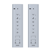 Two silver Toto WASHLET S500 remote controls with multiple function buttons and indicator lights.