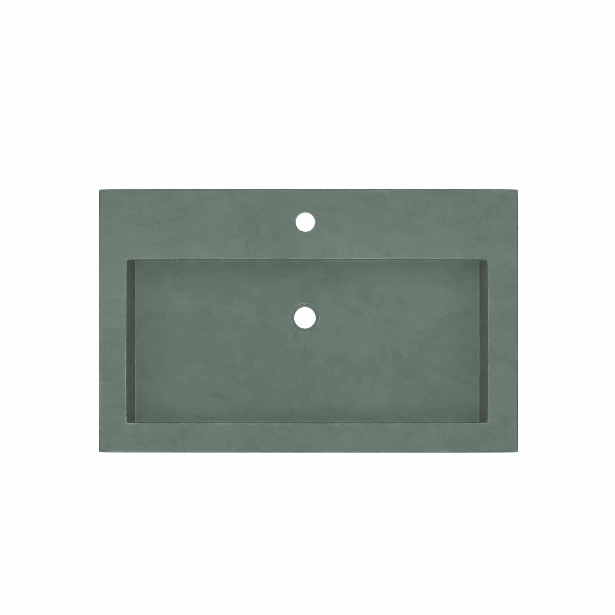 Forest green rectangular trough sink with two white faucet holes, top view.