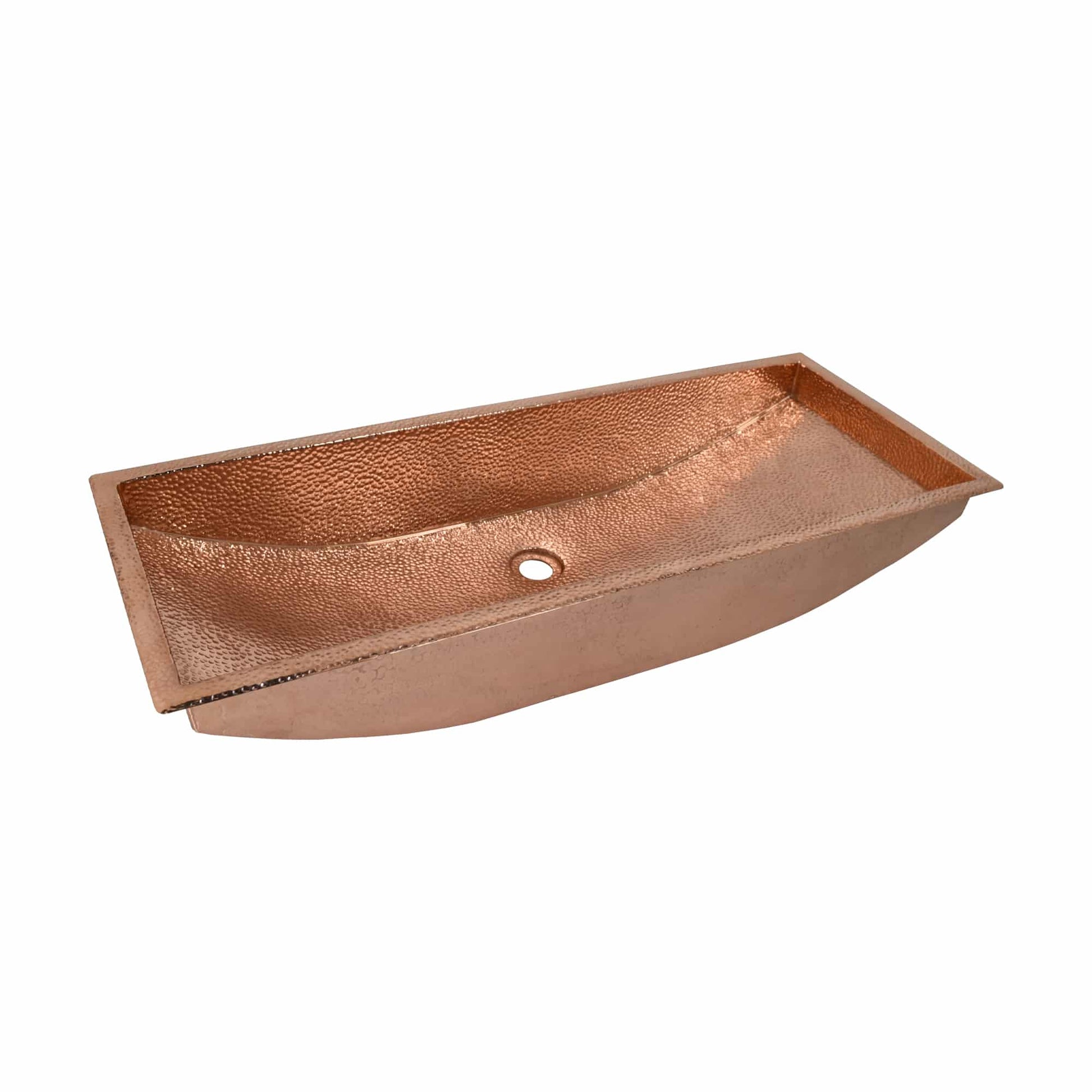 Polished copper trough sink with textured interior, single drain hole, and curved sloped exterior sides.