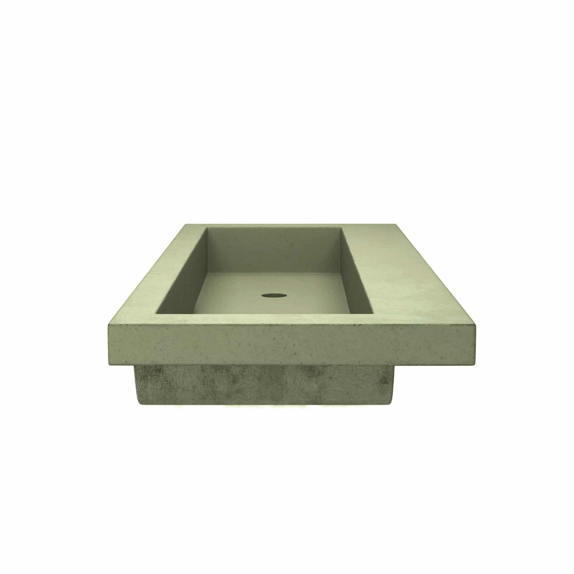 Sage-colored concrete trough sink with rectangular basin and no faucet holes.