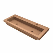 Terracotta rectangular trough sink with two faucet holes and sloped interior basin.