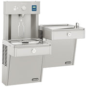 Stainless steel bi-level water station with bottle filling station on top and two drinking fountains at different heights bel