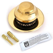 Polished brass foot-actuated tub stopper with grid strainer, two brass fittings, and instruction sheet.