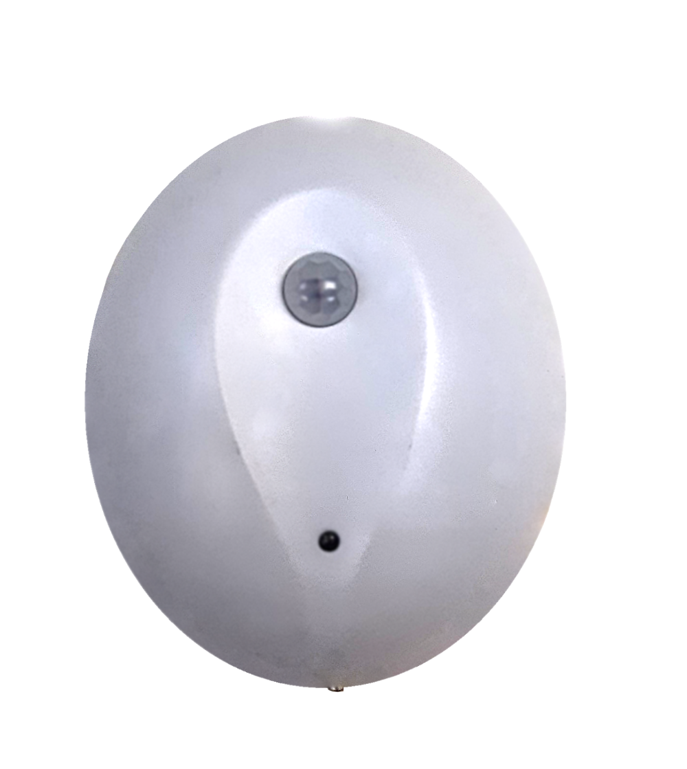 White oval wireless motion sensor with gray circular lens at top center and small black indicator dot below.