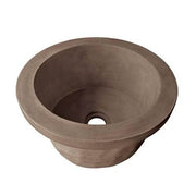 Concrete bar and prep sink with tapered bowl shape and single drain hole in earthy brown tone.