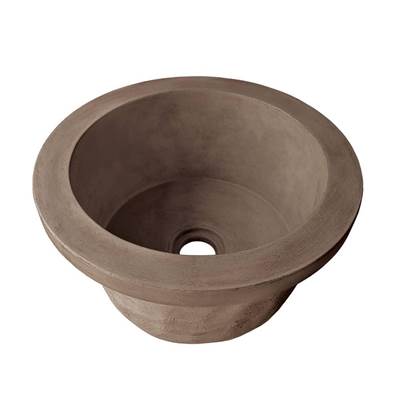 Concrete bar and prep sink with tapered bowl shape and single drain hole in earthy brown tone.