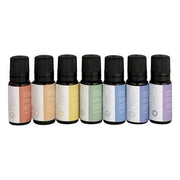 Seven small essential oil bottles with black caps in orange, peach, yellow, green, white, blue, and purple labeled varieties.
