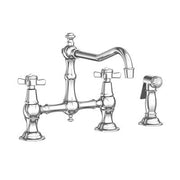Chrome kitchen faucet with high curved spout, two cross handles, and detached side spray.