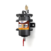 Zilmet ZM20 magnetic system hub with brass top connection, black cylindrical body, side ports, mounting bracket, and red drai
