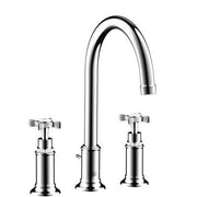 Chrome widespread bathroom faucet with tall curved spout and cross handles on each side.