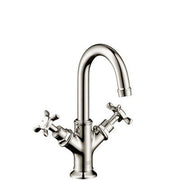 Polished nickel single-hole bathroom faucet with curved spout and cross handles on either side.