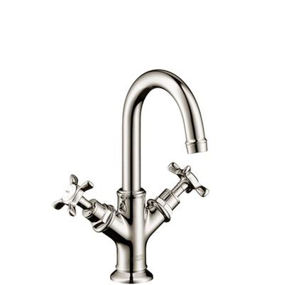 Polished nickel single-hole bathroom faucet with curved spout and cross handles on either side.