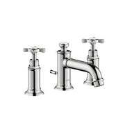 Polished nickel widespread bathroom faucet with two cross handles and curved low spout.