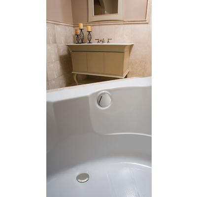 Polished nickel round turn control trim valve mounted on white bathtub edge.
