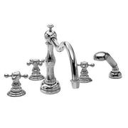 Chrome deck mount roman tub filler with curved spout, two cross handles, and detached handheld showerhead.