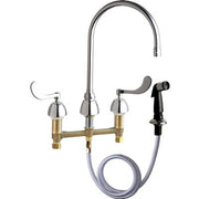 Chrome and brass concealed sink faucet with arched spout, dual handles, and black side spray with hose.