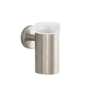 Brushed nickel cylindrical toothbrush holder with clear glass top mounted on round wall bracket.