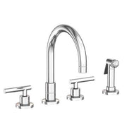 Polished chrome kitchen faucet with curved spout, two handles, and matching side spray attachment.